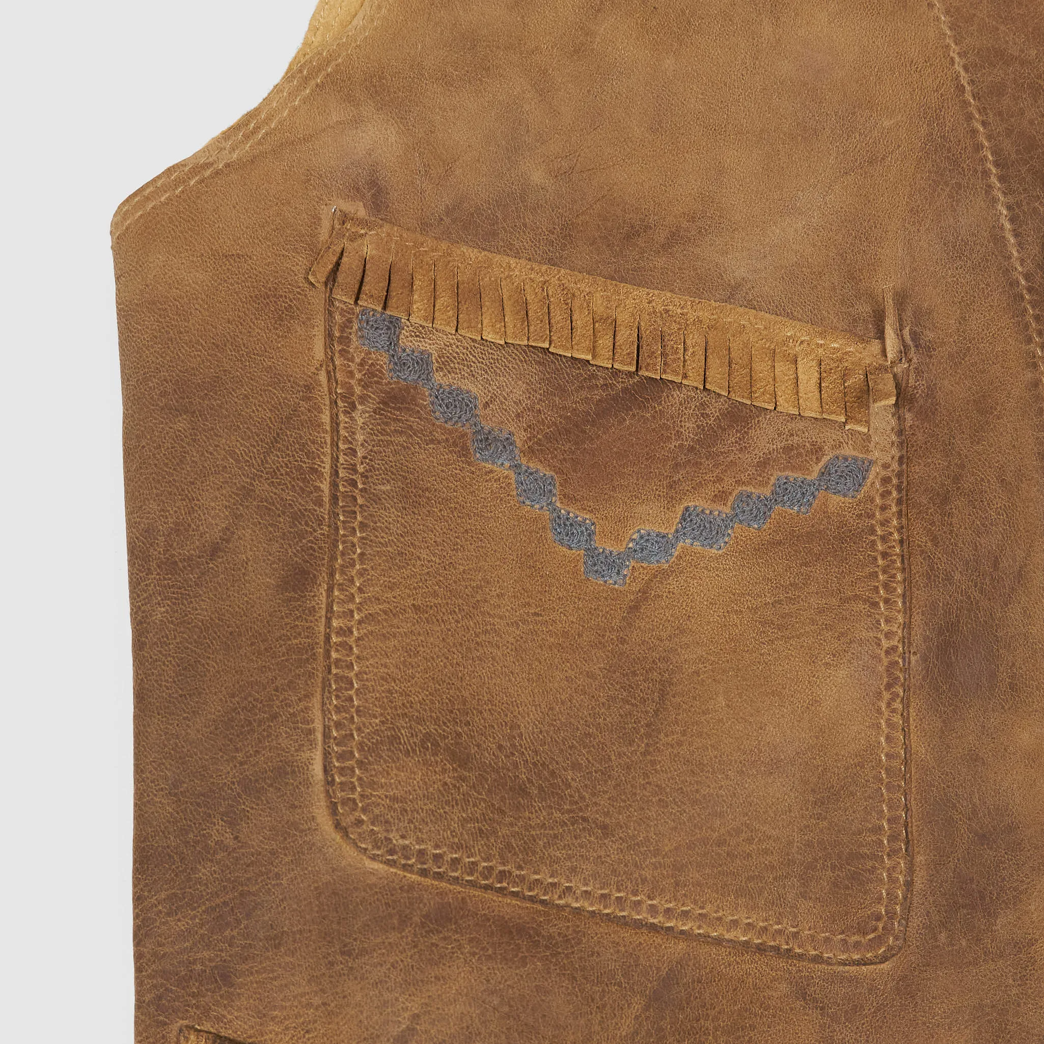 Hand-embroidered sheepskin vest